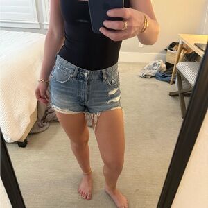 High waisted blue ripped denim shorts